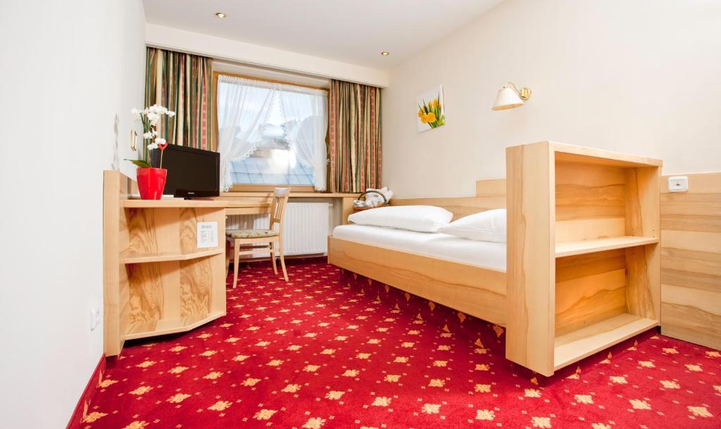 Kirchenwirt Hotell Reith im Alpbachtal Rom bilde